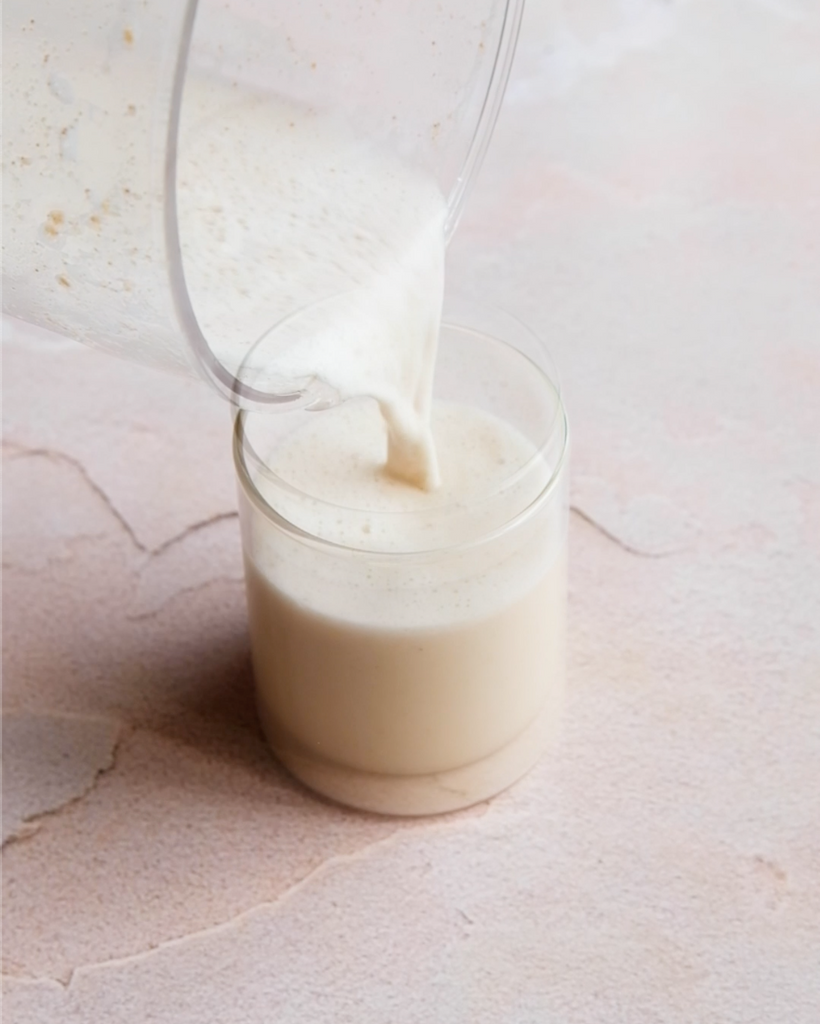 Natural, vegan and keto friendly, this homemade almond milk is made with only happy jars almond butter and water. 